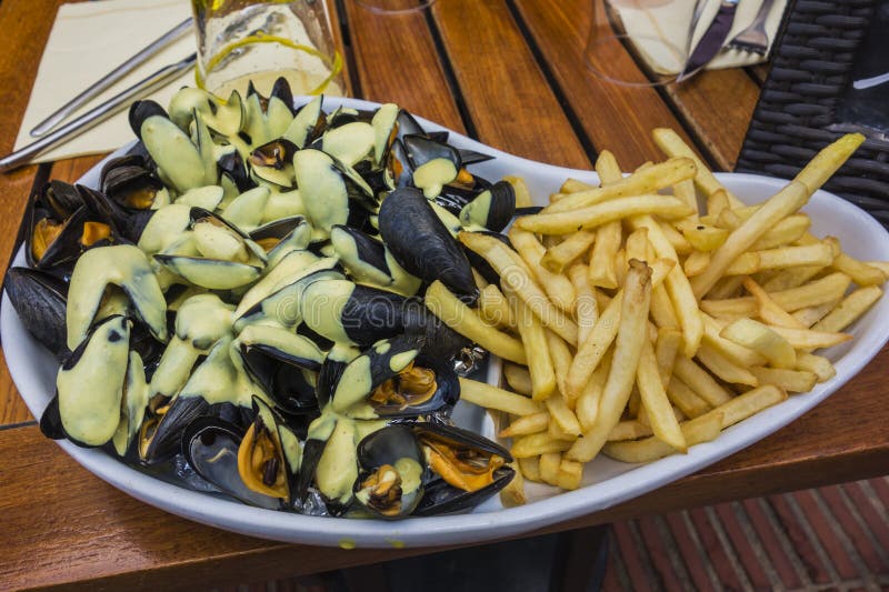 Mussels and chips stock image. Image of mussels, gastronomie 50999231