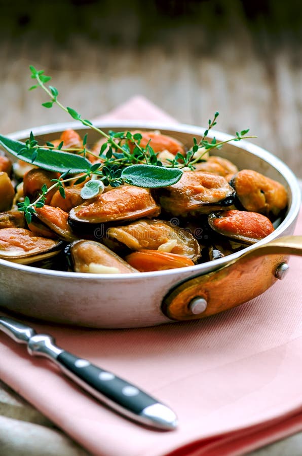 Mussels in cream and garlic sauce with provencal herbs