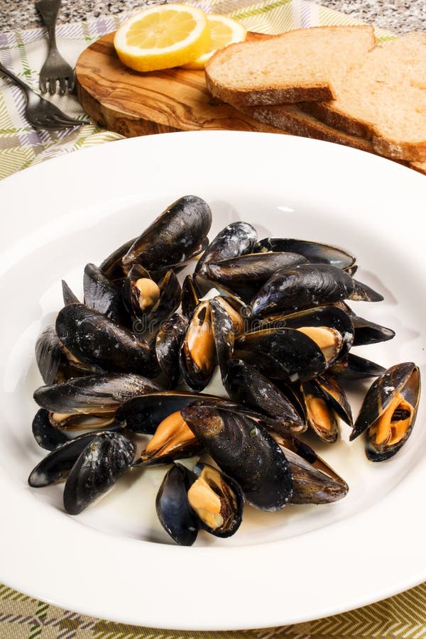 Mussels with Garlic and Butter Sauce in a Deep Plate Stock Image
