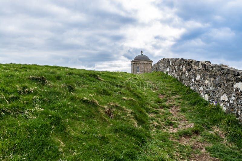 Mussendentempel, de Kustlijn van Noord-Ierland stock foto Mussendentempel, de Kustlijn van Noord-Ierland stock foto