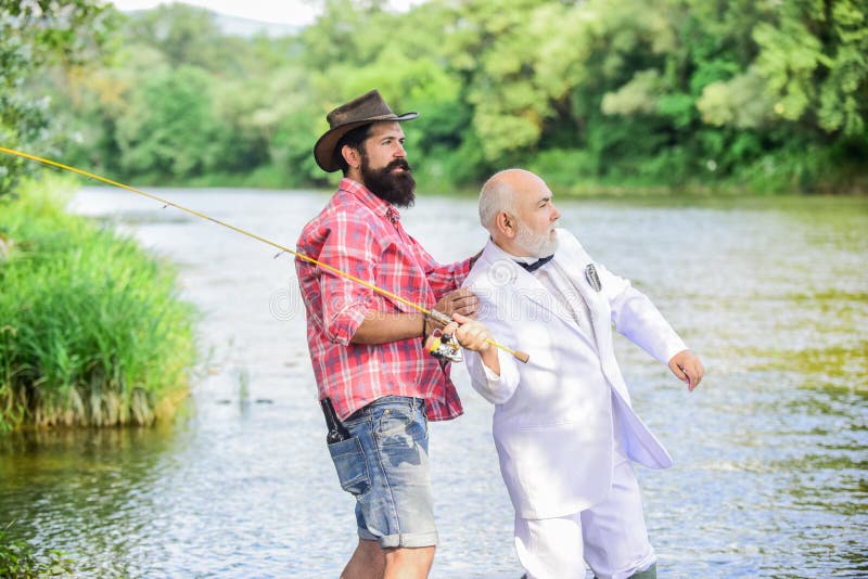 He must use it. retired businessman. male friendship. family, granddad and drandson fishing. hobby and recreation. two stock photos He must use it. retired businessman. male friendship. family, granddad and drandson fishing. hobby and recreation. two stock photos