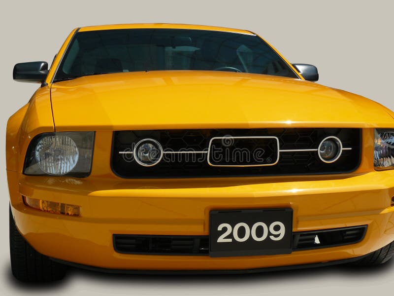 A yellow american car mustang