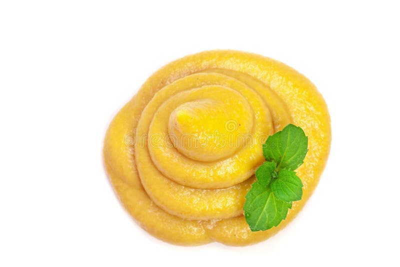 Mustard Sauce with a Mint Leaf on White Background Closeup. Top View