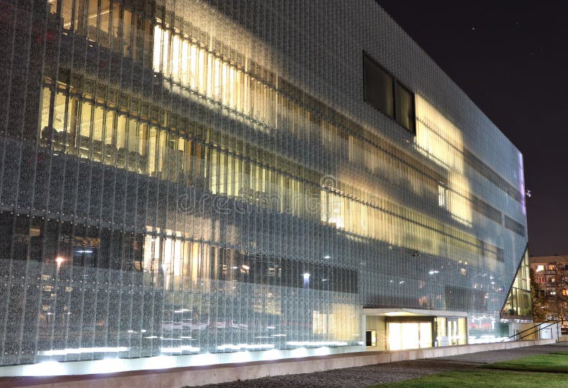 Building of the Museum of History of Polish Jews at night. It is a new museum on the site of the Warsaw ghetto, opened on April 19, 2013. The museum will feature multimedia exhibits on vibrant Jewish community that flourished in Poland for a thousand years. The building, a modern structure in glass and limestone, was designed by Finnish architects Rainer Mahlamäki and Ilmari Lahdelma. Building of the Museum of History of Polish Jews at night. It is a new museum on the site of the Warsaw ghetto, opened on April 19, 2013. The museum will feature multimedia exhibits on vibrant Jewish community that flourished in Poland for a thousand years. The building, a modern structure in glass and limestone, was designed by Finnish architects Rainer Mahlamäki and Ilmari Lahdelma.