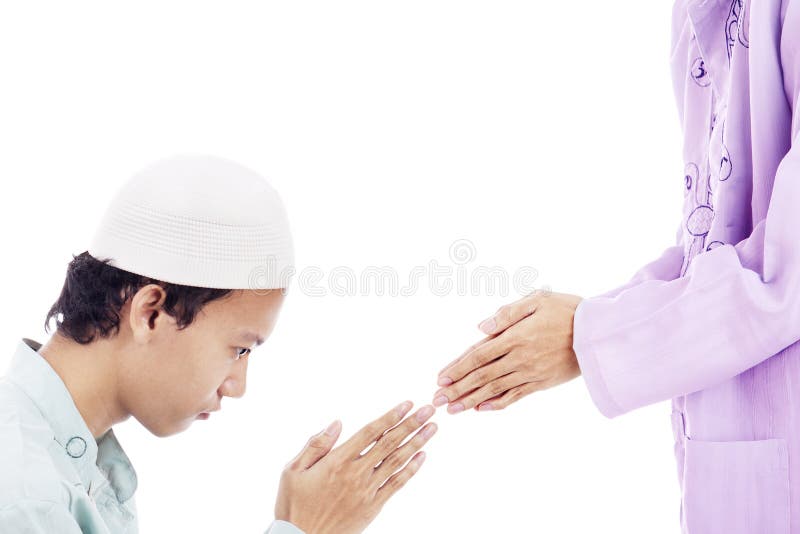 Portrait of muslim man apologize to someone. shot in studio isolated on white. Portrait of muslim man apologize to someone. shot in studio isolated on white