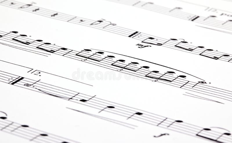 Music notes on white paper with shallow DoF. Music notes on white paper with shallow DoF
