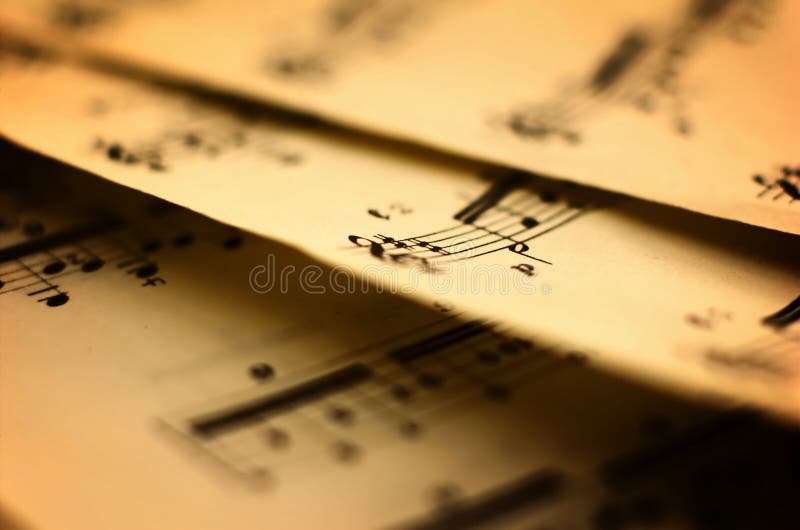 Old sheet music, close-up shot, very shallow depth of field. Could be easily used in any design, enjoy. Old sheet music, close-up shot, very shallow depth of field. Could be easily used in any design, enjoy.