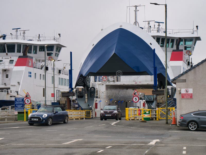 MV Daggri, a roll-on / roll-off car ferry, disembarks cars after arrival at Ulsta on the island of Yell in Shetland, Scotland, UK
