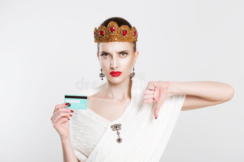 My credit card is blocked. Retro styled woman thumbs down with blank card isolated on white background stock photos My credit card is blocked. Retro styled woman thumbs down with blank card isolated on white background stock photos