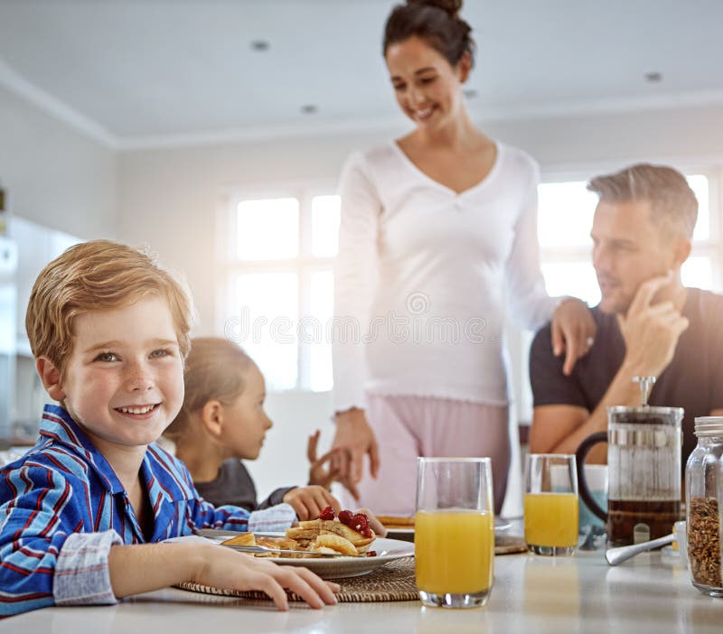 My Family is the Best. a Family Having Breakfast Together. Stock Photo