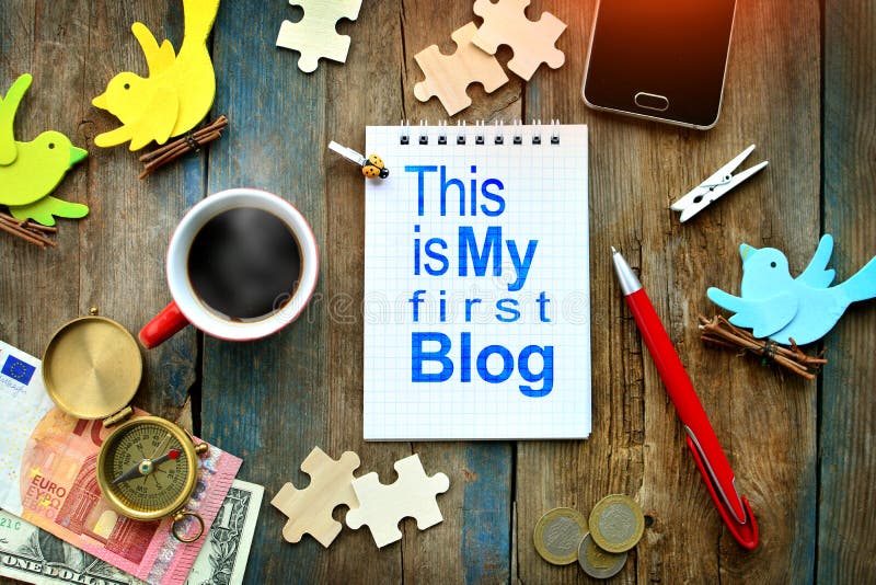 `This is my first blog` introduction written in paper notebook. Blogging and traveling concept stock image `This is my first blog` introduction written in paper notebook. Blogging and traveling concept stock image