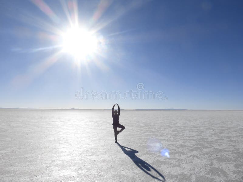 My pose with the sun at the Uyuna Salt Flats