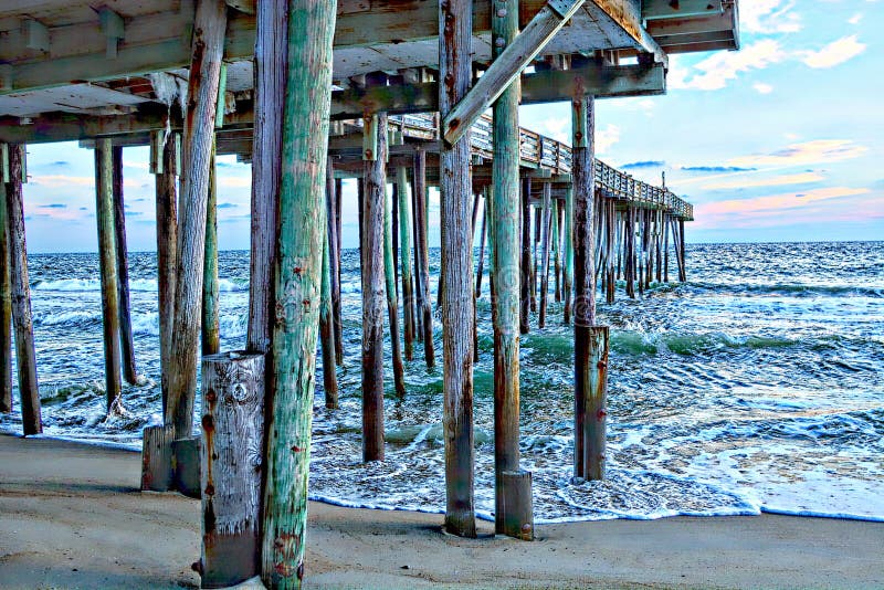 The Myrtle Beach, North Carolina pier on the Outer Banks is a place to fish and eat with a downhome restaurant and wonderful wood boardwalk, plus good fishing. The Myrtle Beach, North Carolina pier on the Outer Banks is a place to fish and eat with a downhome restaurant and wonderful wood boardwalk, plus good fishing.