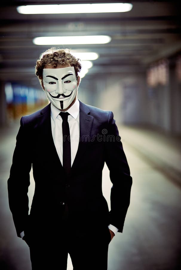 Anonymous Man Wearing a Mask Editorial Stock Image - Image of hold,  european: 31518584