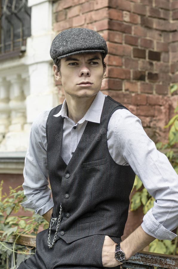 Mysterious Portrait of Retro 1920s English Gangster with Flat Cap ...