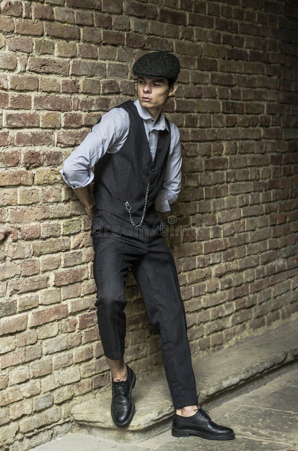 Mysterious Portrait of Retro 1920s English Gangster with Flat Cap ...