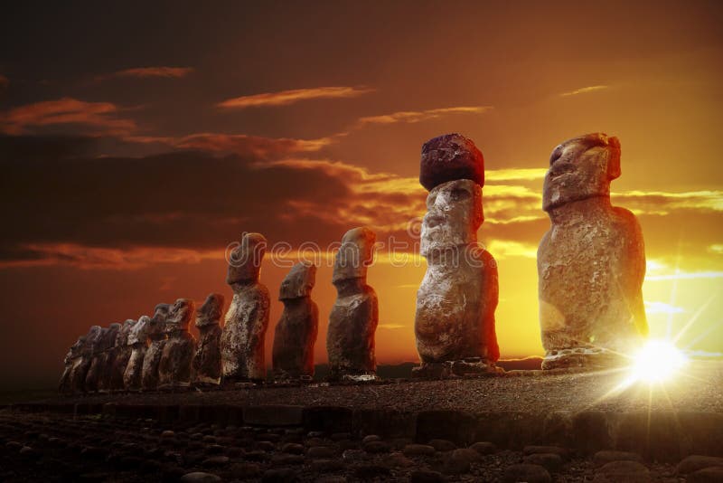Mysterious stone statues at dramatic sunrise royalty free stock photo