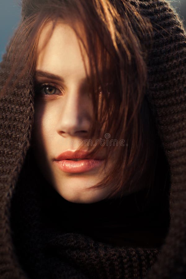 The mysterious woman in a hood royalty free stock image The mysterious woman in a hood royalty free stock image