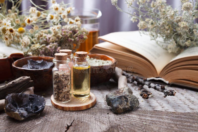 Authentic interior details, glass of herbal rea, homeopathic treatment on rustic wooden background top view, alternative medicine royalty free stock photos Authentic interior details, glass of herbal rea, homeopathic treatment on rustic wooden background top view, alternative medicine royalty free stock photos