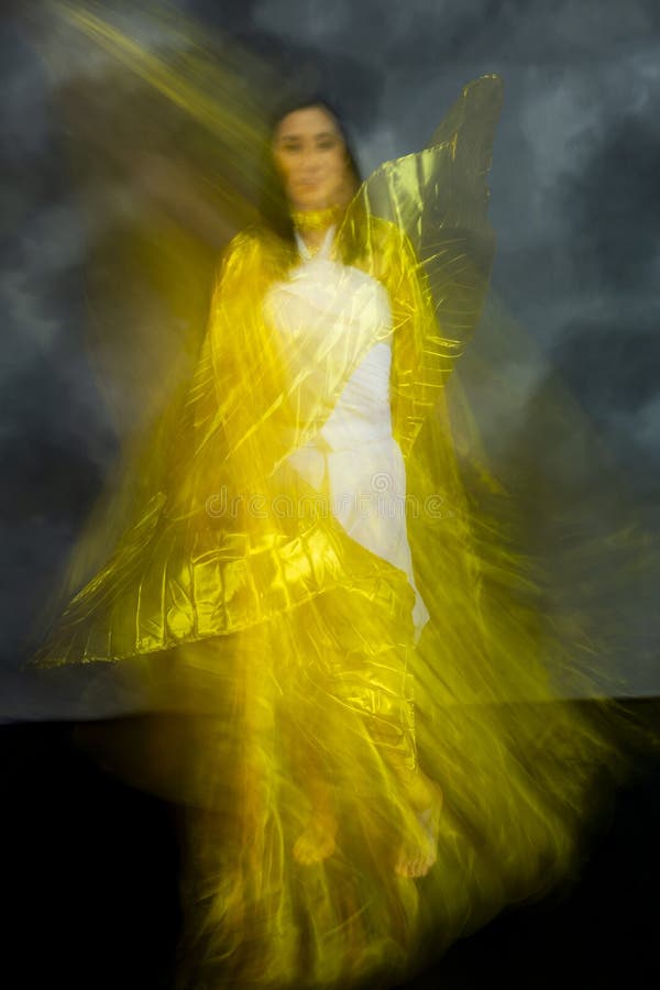 Mystical, Blurry Dance Photo of Adult Woman with Gold Fabric Stock ...