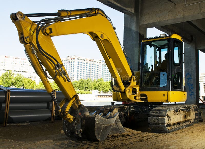 Escavadora amarela fotografia de stock royalty free