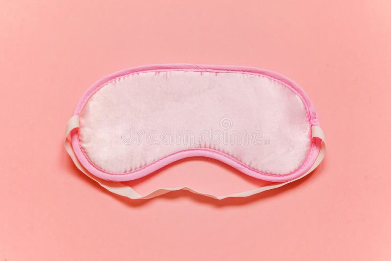 Máscara do sono no fundo cor-de-rosa foto de stock royalty free Máscara do sono no fundo cor-de-rosa foto de stock royalty free
