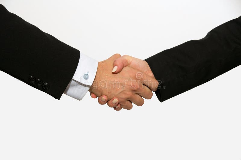 Mâle habillé par affaires et femelle se serrant la main images stock Mâle habillé par affaires et femelle se serrant la main images stock