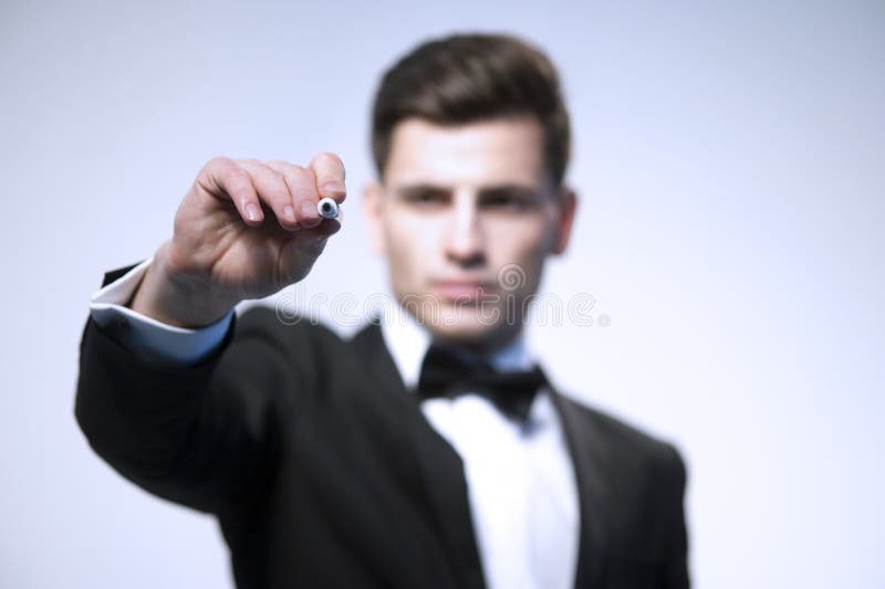 A mão do homem de negócio escreve fotografia de stock A mão do homem de negócio escreve fotografia de stock
