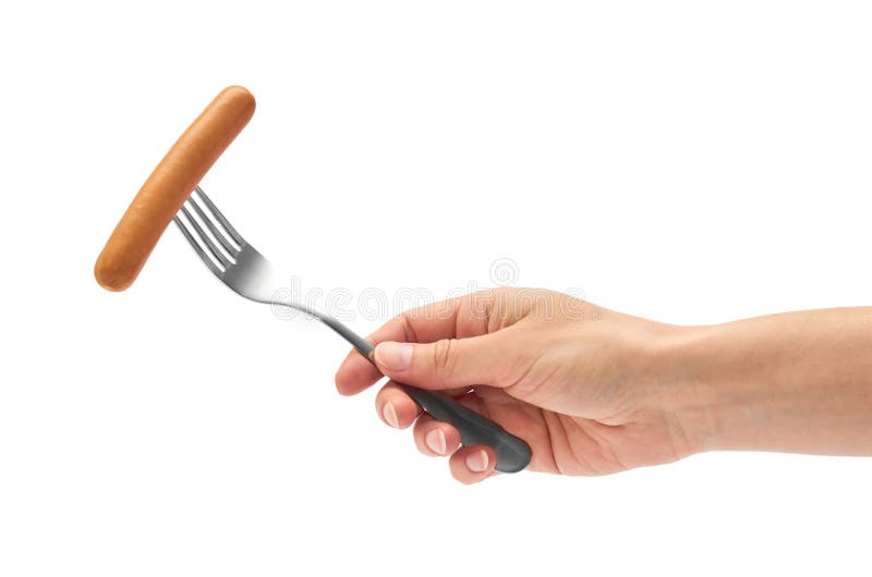 A mão fêmea guarda a salsicha de salsicha tipo frankfurter em uma forquilha Isolado no fundo branco fotografia de stock royalty free A mão fêmea guarda a salsicha de salsicha tipo frankfurter em uma forquilha Isolado no fundo branco fotografia de stock royalty free