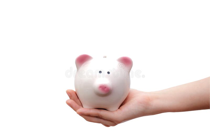 Mão que mantém o mealheiro isolado no fundo branco Conceito da economia imagens de stock royalty free Mão que mantém o mealheiro isolado no fundo branco Conceito da economia imagens de stock royalty free