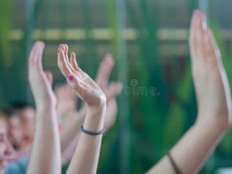 Senior teacher teaching lessons, smart students group raise hands up in school classroom on class. Senior teacher teaching lessons, smart students group raise hands up in school classroom on class