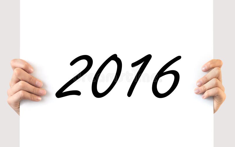 Mãos a segurar um quadro branco 2016 imagem de stock