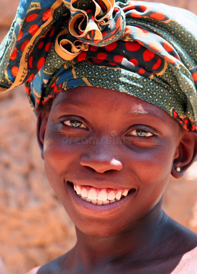 Fulani girl in Africa with a big smile. Fulani girl in Africa with a big smile