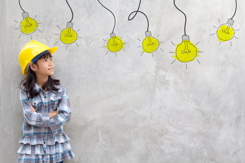 Smiling little girl in yellow helmet with light bulb ideas. Smiling little girl in yellow helmet with light bulb ideas