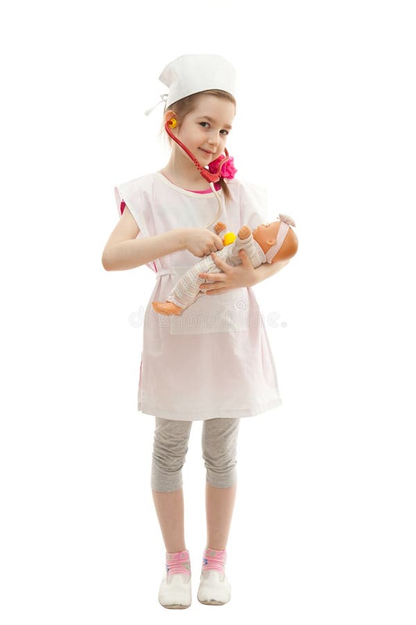 Mädchen im Arztkleid lizenzfreie stockfotografie