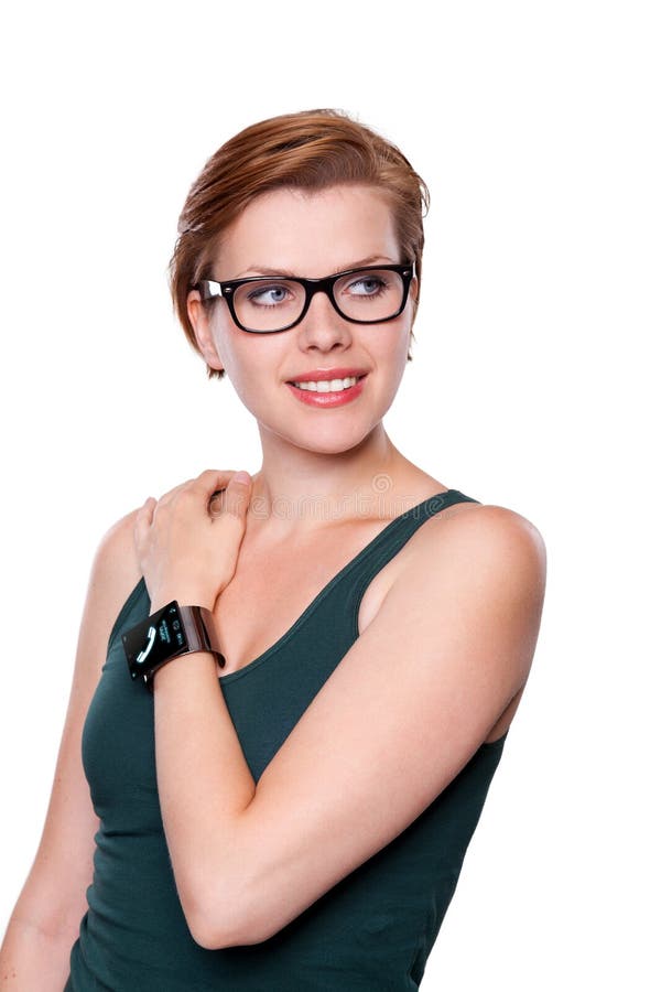 Mädchen mit einer Internet-intelligenten Uhr lokalisiert auf Weiß lizenzfreies stockbild Mädchen mit einer Internet-intelligenten Uhr lokalisiert auf Weiß lizenzfreies stockbild