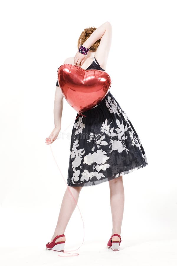 Mädchen mit heart-shaped Ballonen stockfotografie Mädchen mit heart-shaped Ballonen stockfotografie