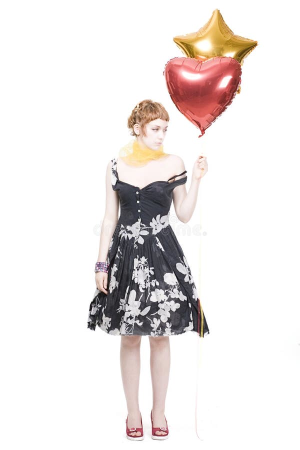 Mädchen mit Innerem und sternförmigen Ballonen lizenzfreies stockfoto Mädchen mit Innerem und sternförmigen Ballonen lizenzfreies stockfoto