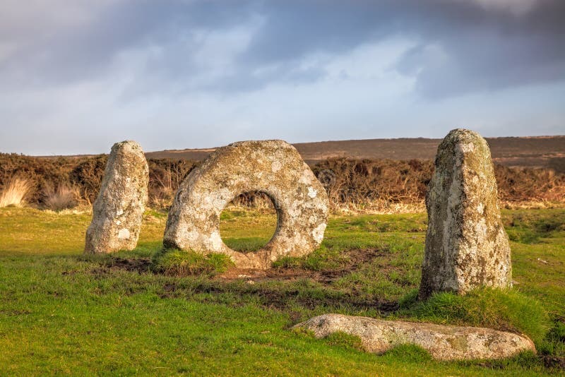 The Men-an-Tol is thought to date to either the late Neolithic or early Bronze Age. Located on Penwith Moor Cornwall England these standing stones are steeped in myth and legend. The Men-an-Tol is thought to date to either the late Neolithic or early Bronze Age. Located on Penwith Moor Cornwall England these standing stones are steeped in myth and legend.