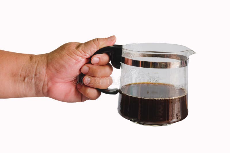 Männer Hand halten eine heiße Kaffeekanne lizenzfreie stockfotos