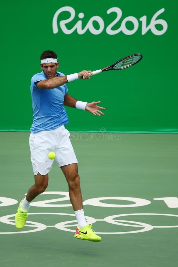 RIO DE JANEIRO, BRAZIL - AUGUST 11, 2016: Grand Slam champion Juan Martin Del Potro of Argentina in action during his quarterfinal match of the Rio 2016 Olympic Games at the Olympic Tennis Centre. RIO DE JANEIRO, BRAZIL - AUGUST 11, 2016: Grand Slam champion Juan Martin Del Potro of Argentina in action during his quarterfinal match of the Rio 2016 Olympic Games at the Olympic Tennis Centre