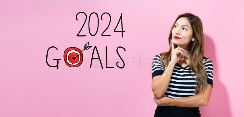 Mål för 2024 med unga kvinnor royaltyfri fotografi