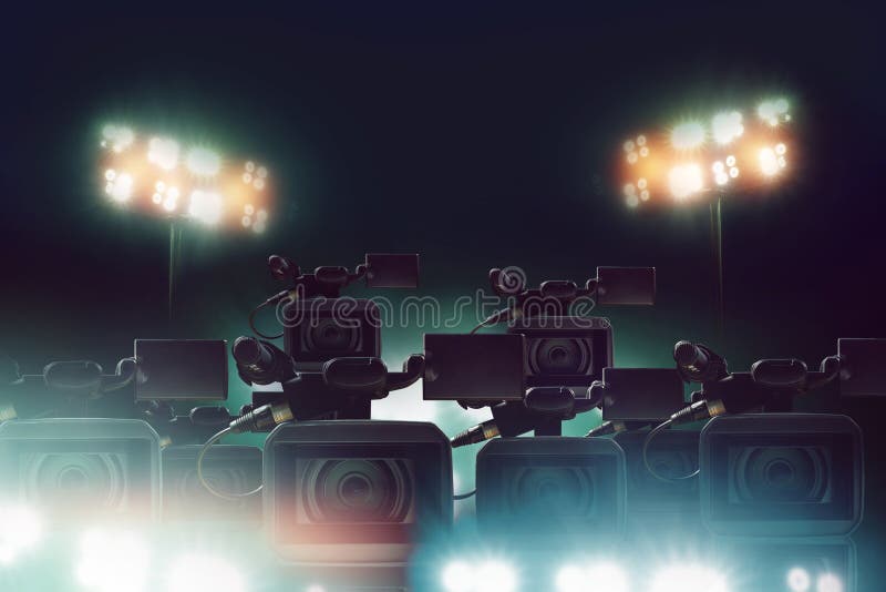 Många videokamera av press med ljus i stadion arkivfoto Många videokamera av press med ljus i stadion arkivfoto