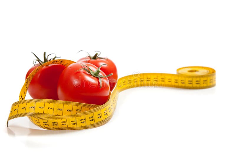 A tomato with a tape measure. A tomato with a tape measure