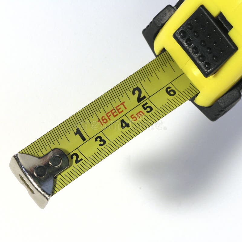 Yellow tape measure on white background. Yellow tape measure on white background
