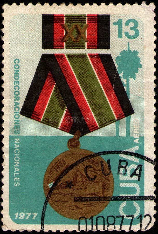 CUBA - CIRCA 1977: postal stamp 13 Cuban centavos printed by Republic of Cuba, shows Medal 20 years of the Revolutionary Armed Forces, circa 1977. CUBA - CIRCA 1977: postal stamp 13 Cuban centavos printed by Republic of Cuba, shows Medal 20 years of the Revolutionary Armed Forces, circa 1977