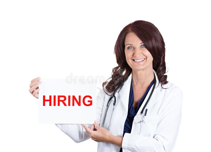 Médecin ou infirmière féminin montrant le signe de location image stock Médecin ou infirmière féminin montrant le signe de location image stock