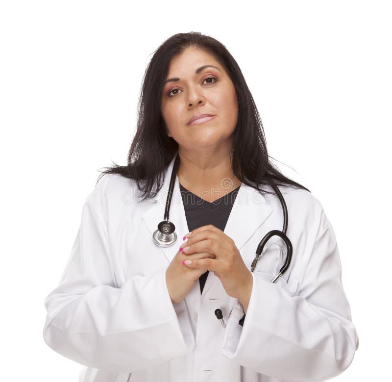 Médecin ou infirmière hispanique féminin intéressé photographie stock Médecin ou infirmière hispanique féminin intéressé photographie stock