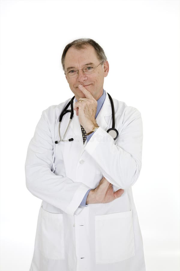 Médico caucasiano com entradas, vestindo um casaco branco imagem de stock royalty free