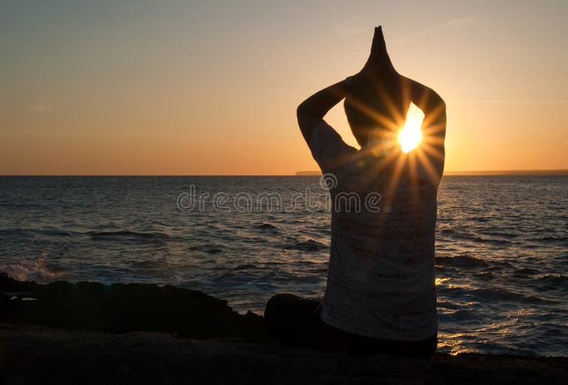 Woman meditating on the shores of the Mediterranean. Woman meditating on the shores of the Mediterranean